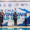 Vietnamese Nguyen Tran San San (top podium) and two teammates at the victory ceremony of the girls' 12-17 year-old 1.500m surface at the 18th CMAS Finswimming World Cup 2024 Round 4 in Phuket, Thailand (Photo: HCMC Finswimming)