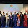 Vietnamese Ambassador Ngo Huong Nam and the embassy's staff at the event. (Photo: VNA)