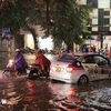 Flooding at the intersection of Ba Trieu and Tran Nhan Tong streets in Hai Ba Trung district, Hanoi. (Photo: VNA)