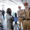 At a trial installation of QR code scanners at elevated railway stations in Hanoi on December 9, 2021. (Photo: VNA)