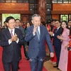 Vietnamese and Lao leaders at the meeting (Photo: VNA)