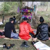 The Xen Dong Festival begins with a forest worship ceremony, held beneath the canopy of a centuries-old banyan tree (Photo: VietnamPlus)