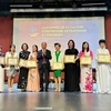 Enterprises with great contributions to promoting the Vietnamese corporate culture are honoured at the forum. (Photo: VNA)