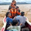 Rescuers evacuate people from flooded areas in Nay Pyi Taw, Myanmar, on September 13 (Photo: XINHUA/VNA)