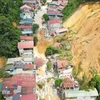 The scene of a landslide that results in two fatalities in Yen Ninh ward, Yen Bai city. (Photo: VNA)