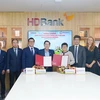 HDBank and Proparco’s leaders at a ceremony for signing a credit facility worth US$50 million in HCM City on September 16. (Photo courtesy of HDBank)