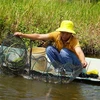 A farmer harvesting shrimp and crabs in the Mekong Delta province of Kien Giang. (Photo: VNA)