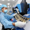 Manufacturing electronic components (Photo: VNA)