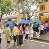 Tourists experience the culture of queuing during the subsidy period at the Hanoi Autumn Festival. (Source: laodongthudo.vn)