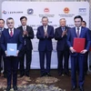 Party General Secretary and President To Lam witnesses the exchange of the MoU between Petrovietnam and Kellogg Brown & Root. (Photo: Petrotimes)