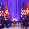 At the meeting between General Secretary of the Communist Party of Vietnam Central Committee and State President To Lam (L) and US President Joe Biden on September 25 (Photo: VNA)