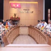 Thua Thien - Hue and Champasak officials at the working session on September 26 (Photo: VNA)