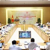 Prime Minister Pham Minh Chinh chairs the conference on September 28. (Photo: VNA)