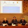 Deputy Minister of Foreign Affairs Do Hung Viet (C) at the international seminar in Geneva on September 27. (Photo: VNA)