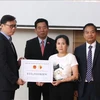 Vietnamese Association in Jeonbuk supports victims of typhoon Yagi (Photo: VNA)