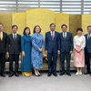 Chairman of Da Nang People’s Committee Le Trung Chinh (sixth, right) and New Zealand Ambassador Caroline Beresford (fifth, left) at the reception on October 1 (Photo: VNA)