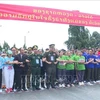 Young officers of Vietnam and Laos take part in cross-border marathon on October 2. (Photo: VNA)