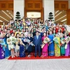 Prime Minister Pham Minh Chinh and delegates to the ongoing conference of the International Network of Women Engineers and Scientists (INWES) in the Asia-Pacific as well as leaders of the Vietnam Association for Intellectual Women pose for a group photo in Hanoi on October 4. (Photo: VNA)