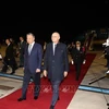 Party General Secretary and State President To Lam (L) welcomed at Paris's Orly Airport (Photo: VNA)