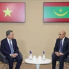 Party General Secretary and State President To Lam meets with President of Mauritania Mohamed Ould Ghazouani, in Paris on October 5. (Photo: VNA)