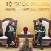 Minister of National Defence Gen. Phan Van Giang (R) and Spanish Ambassador to Vietnam Carmen Cano De Lasala (Photo: VNA)