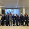 The State Audit Office of Vietnam (SAV) delegation take a photo with Chief Executive of the Association of Chartered Certified Accountants (ACCA) Helen Brand. (Photo: VNA)