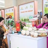 At the exhibition showcasing Vietnam’s distinctive farm produce exported to China opened in Hanoi on October 13. (Photo: thoibaotaichinhvietnam.vn)