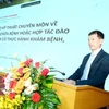 Duong Huy Luong, Deputy Director of Medical Examination and Treatment Management Department, speaks at the event (Photo: VietnamPlus)