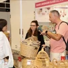 Foreign consumers visit a Vietnamese booth at the MEGA Show Hong Kong 2024. (Photo: VNA)