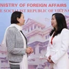 Deputy Foreign Minister Le Thi Thu Hang (R) and UK Parliamentary Under-Secretary of State at the Foreign, Commonwealth and Development Office covering the Indo Pacific Catherine West talk on the sidelines of the dialogue. (Photo: VNA)