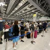 Passengers at the Suvarnabhumi international airport in Thailand. (Photo: vov.vn) 