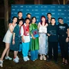 Director Duong Dieu Linh (with red hair) and members of the film crew at the Venice Film Festival. (Photo: film crew)