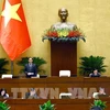 NA Vice Chairman Tran Quang Phuong speaks at the session. (Photo: VNA)