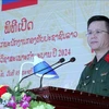 Colonel Nguyen Dinh Duc, who is in charge of the trade union affairs division at the General Department of Politics of the Vietnam People’s Army, speaks at the opening of the training course. (Photo: VNA)