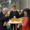 Philippe Juglar, President of AVPA, tastes Vietnamese tea. (Photo: VNA)