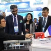 Visitors to International Exhibition on Water Supply, Drainage, and Environmental Sanitation (Photo: VNA)