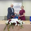 Swiss Ambassador to Vietnam Thomas Gass and World Bank Country Director for Vietnam, Cambodia and Lao, Mariam J. Sherman, at the signing ceremony of the Vietnam Accelerating Green and Resilient Growth in Large Cities Single-Donor Trust Fund. (Photo courtesy of the World Bank)