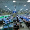 A mobile phone production line (Photo: VNA)