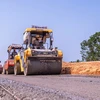 Contractors construct a section of a North-South Expressway project in the 2021-2025 period. (Photo: VietnamPlus)