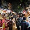 On the evening of September 17, or the 15th day of the eighth lunar month, Hang Ma street in Hoan Kiem district is beautifully illuminated by thousands of star-shaped lanterns and traditional lanterns for the Mid-Autumn Festival. (Photo: VietnamPlus)