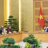 Prime Minister Pham Minh Chinh receives UN Resident Coordinator Pauline Tamesis and heads of UN agencies in Vietnam. (Photo: VNA)