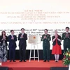 State President of Vietnam Luong Cuong (fifth, left) and delegates inaugurate the Vietnamese Defence Attaché’s Office in Chile (Photo: VNA)