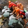 Repair following flood in the Philippines (Photo: EPA)