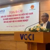 Vice Chairman of the Vietnam Chamber of Commerce and Industry (VCCI) Hoang Quang Phong speaks at the event. (Photo: VNA)