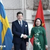 Speaker of the Riksdag Andreas Norlén (L) welcomes State Vice President of Vietnam Vo Thi Anh Xuan. (Photo: VNA)