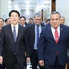 State President Luong Cuong (L) and President of the Council of Ministers of Peru Gustavo Adriazén. (Photo: VNA)