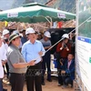 PM Pham Minh Chinh (third from left) checks the construction of a section of Dong Dang - Tra Linh expressway in Thach An district, Cao Bang province, on November 14. (Photo: VNA)