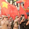 A reenactment of October 10, 1954, when the Vietnamese army triumphantly entered the capital city filled with flags, flowers, and the euphoria of victory. (Photo: VietnamPlus)