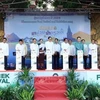 Delegates launch the food festival, product exhibition, and distribution event in Laos’s Khammouane province. (Photo: VNA)