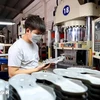 Workers at an industrial park - Illustrative image (Photo: VNA)